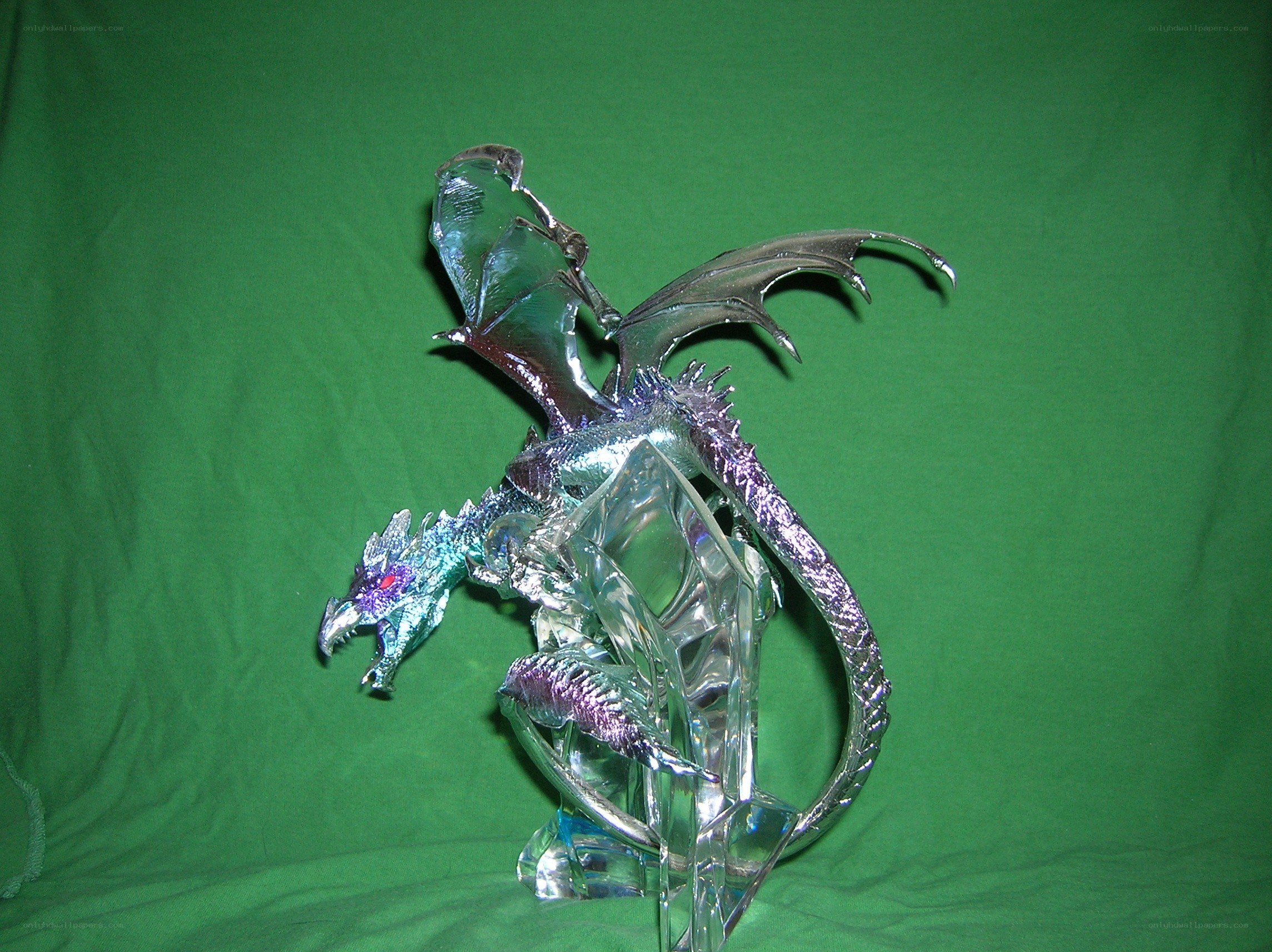 dragon figurine on green background