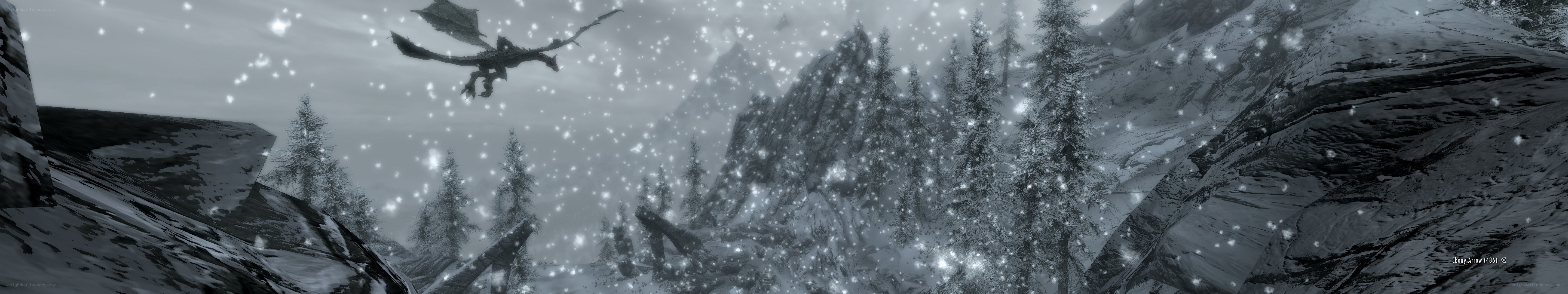 dragon flying in snowy mountains