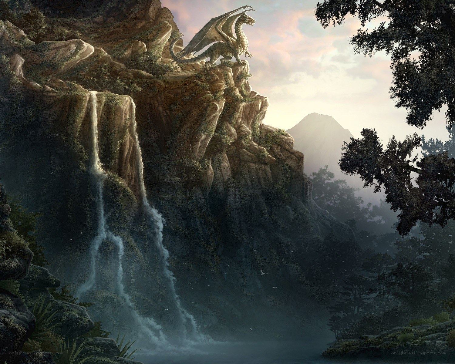 Dragon on a cliff at sunset