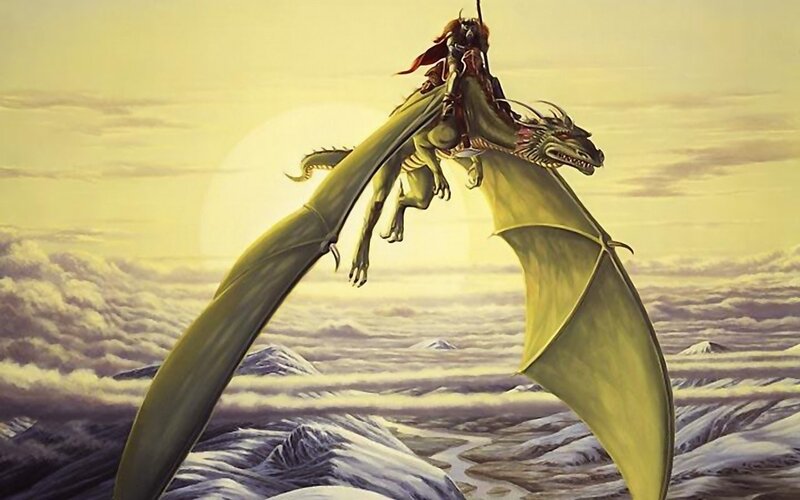 dragon rider in golden sky