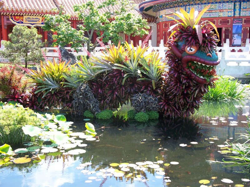 Dragon sculpture in garden pond