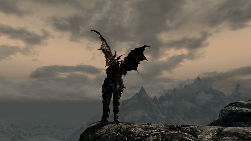 dragonborn on a mountain peak