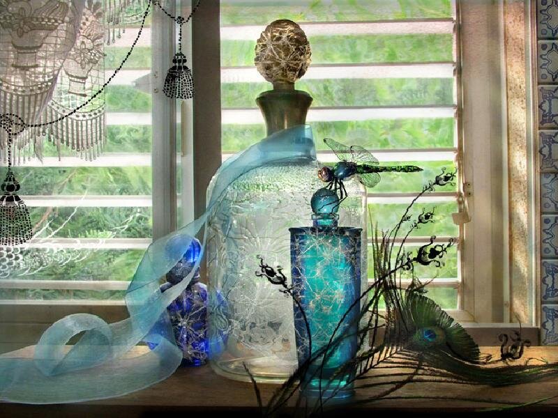 Dragonfly on Glass Bottles