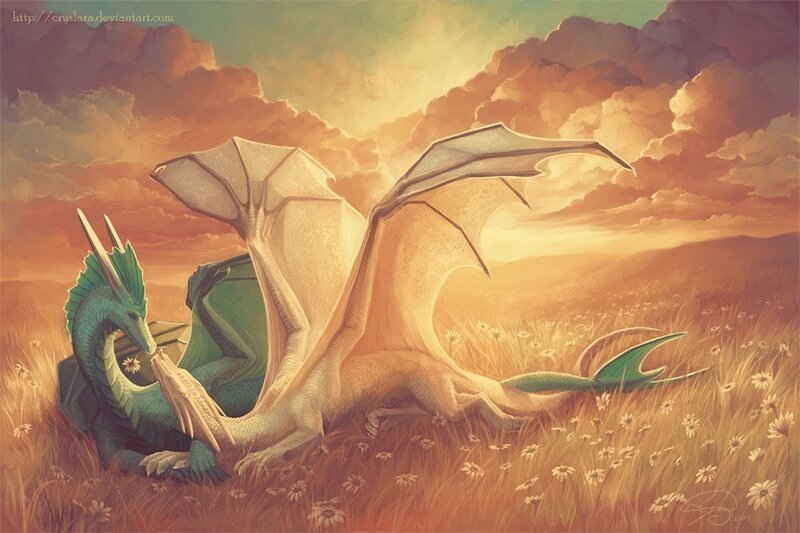 Dragons in a field at sunset