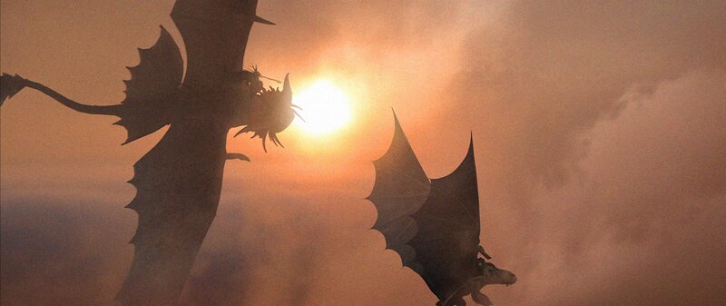 Dragons Silhouetted Against Sun