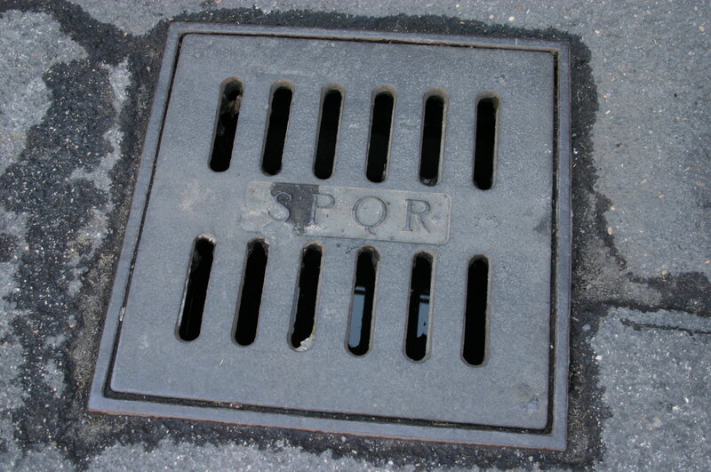 drain cover with spqr inscription