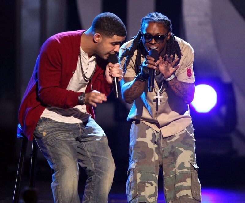 Drake and Lil Wayne performing