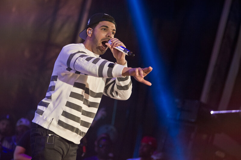 Drake performing on stage