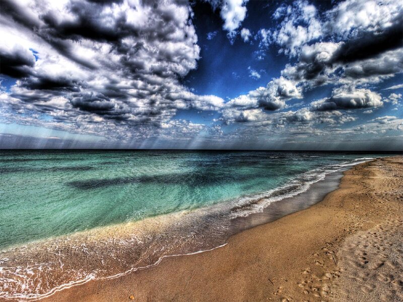 dramatic beach with stormy sky
