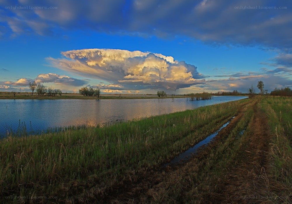Dramatic cloud over a river
