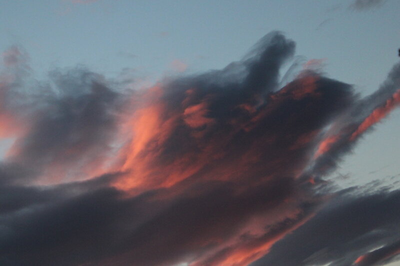 Dramatic Clouds at Sunset — Orange