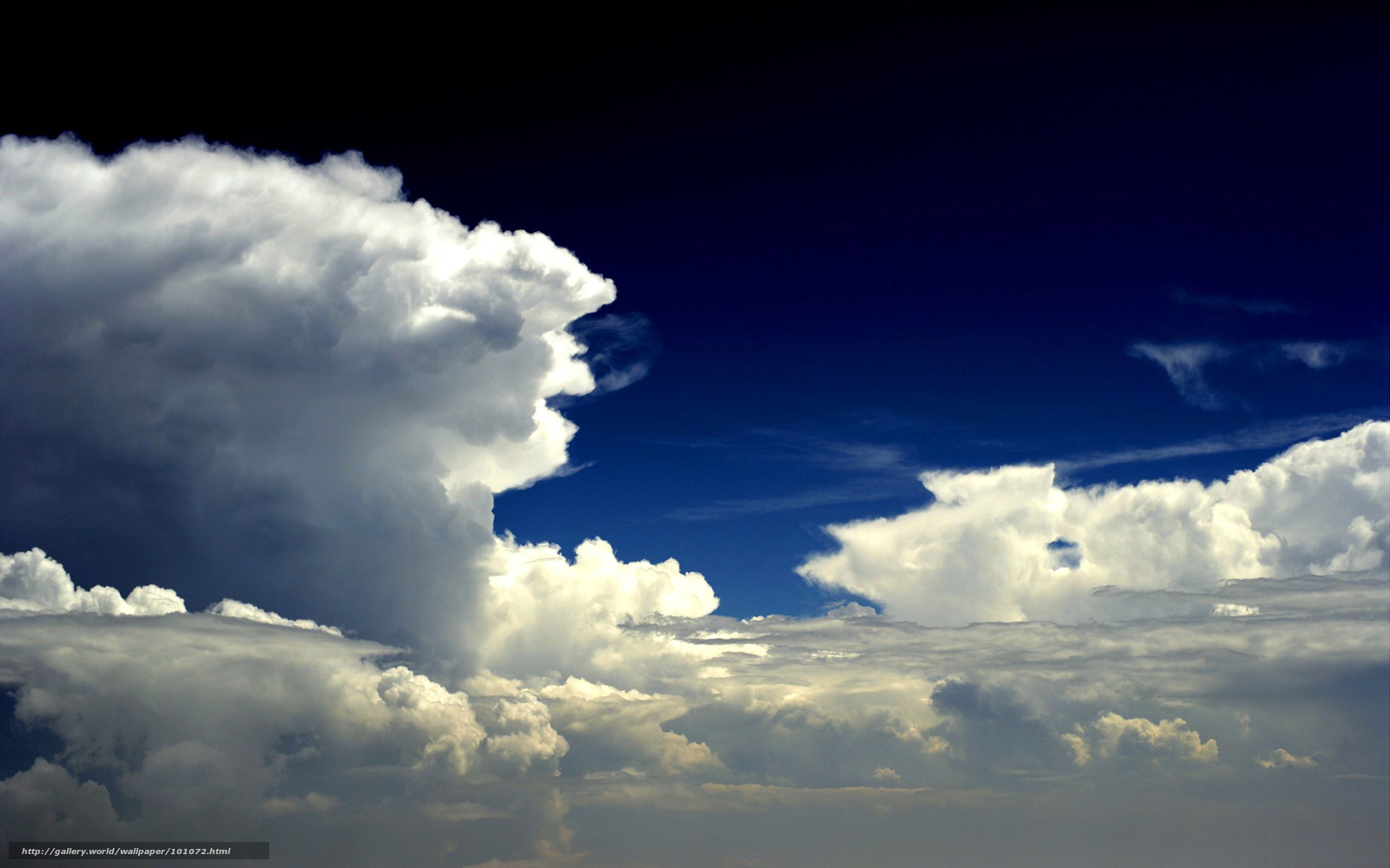 Dramatic clouds in blue sky
