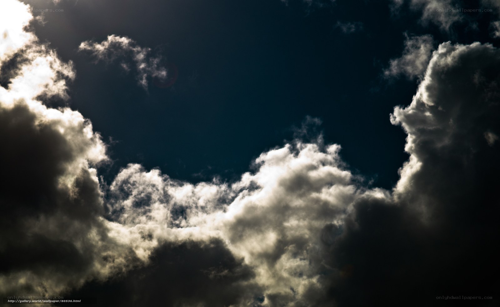 Dramatic clouds in dark sky