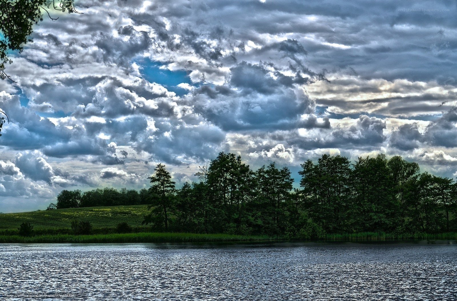 Dramatic Clouds Over a Lake