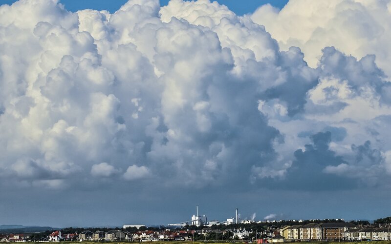 Dramatic clouds over coastal town