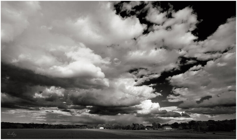 Dramatic Clouds Over Farmland