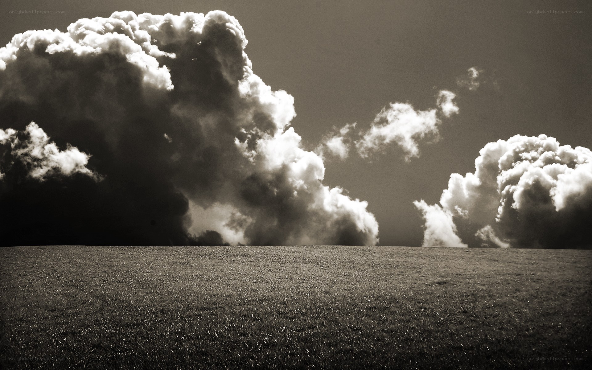 Dramatic Clouds Over Field