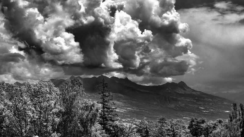 dramatic clouds over mountains