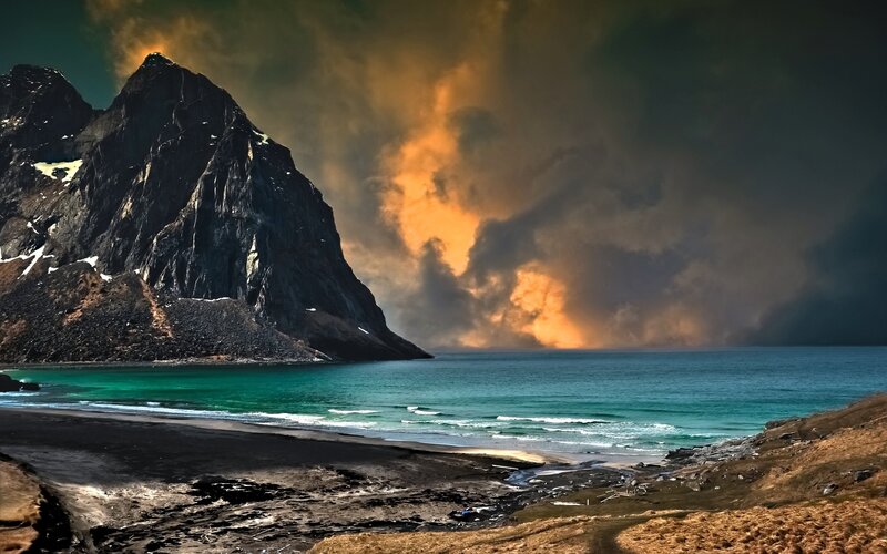 dramatic coastal mountain scene
