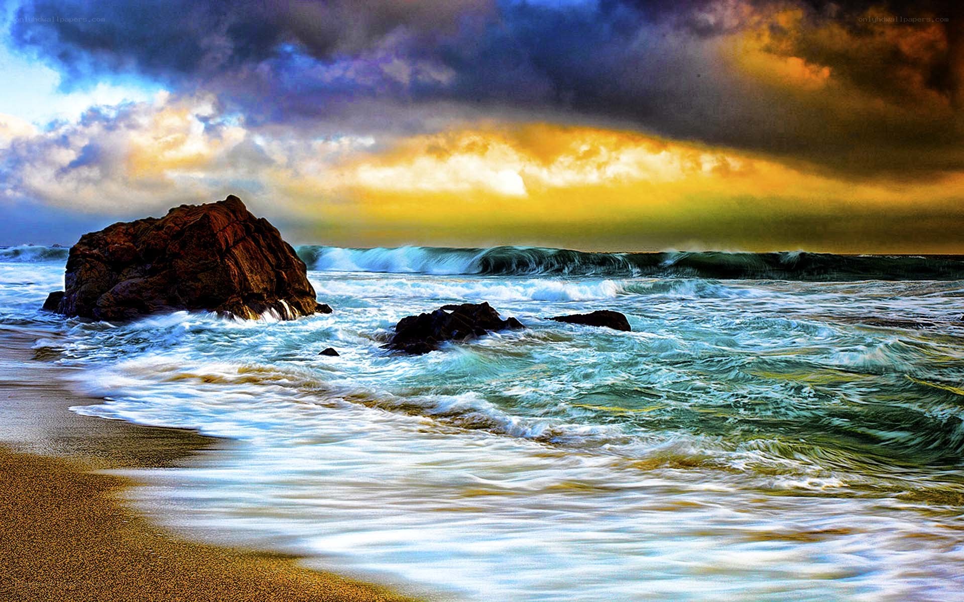 Dramatic ocean sunset with rocks