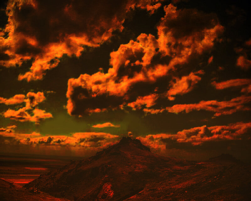 dramatic red sky over mountains