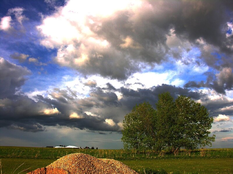 Dramatic sky over a rural field