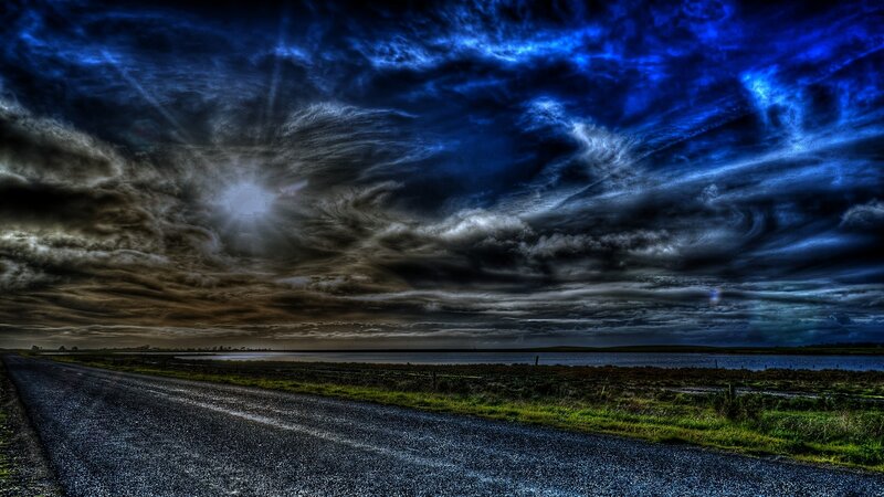 Dramatic sky over a rural road