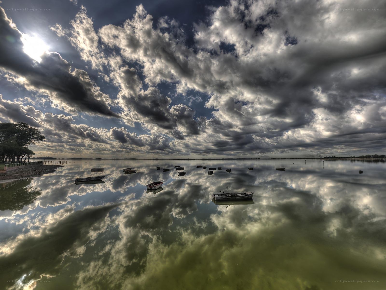Dramatic sky over calm lake