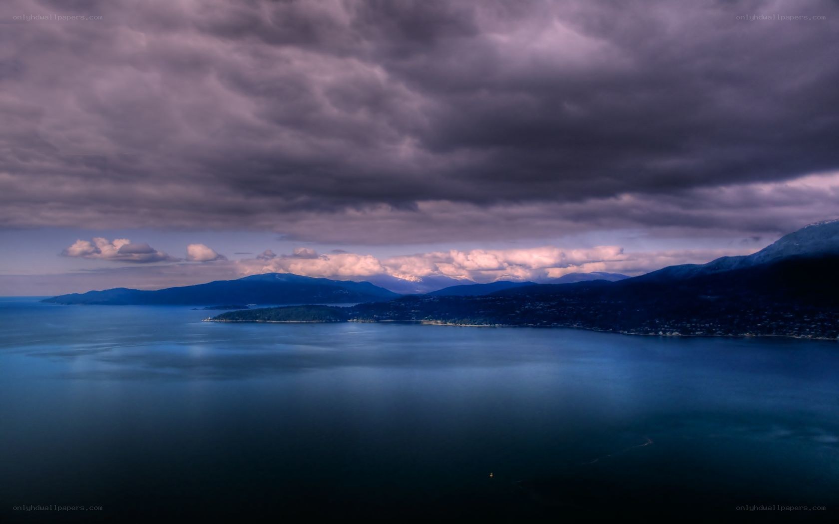 dramatic sky over coastal bay