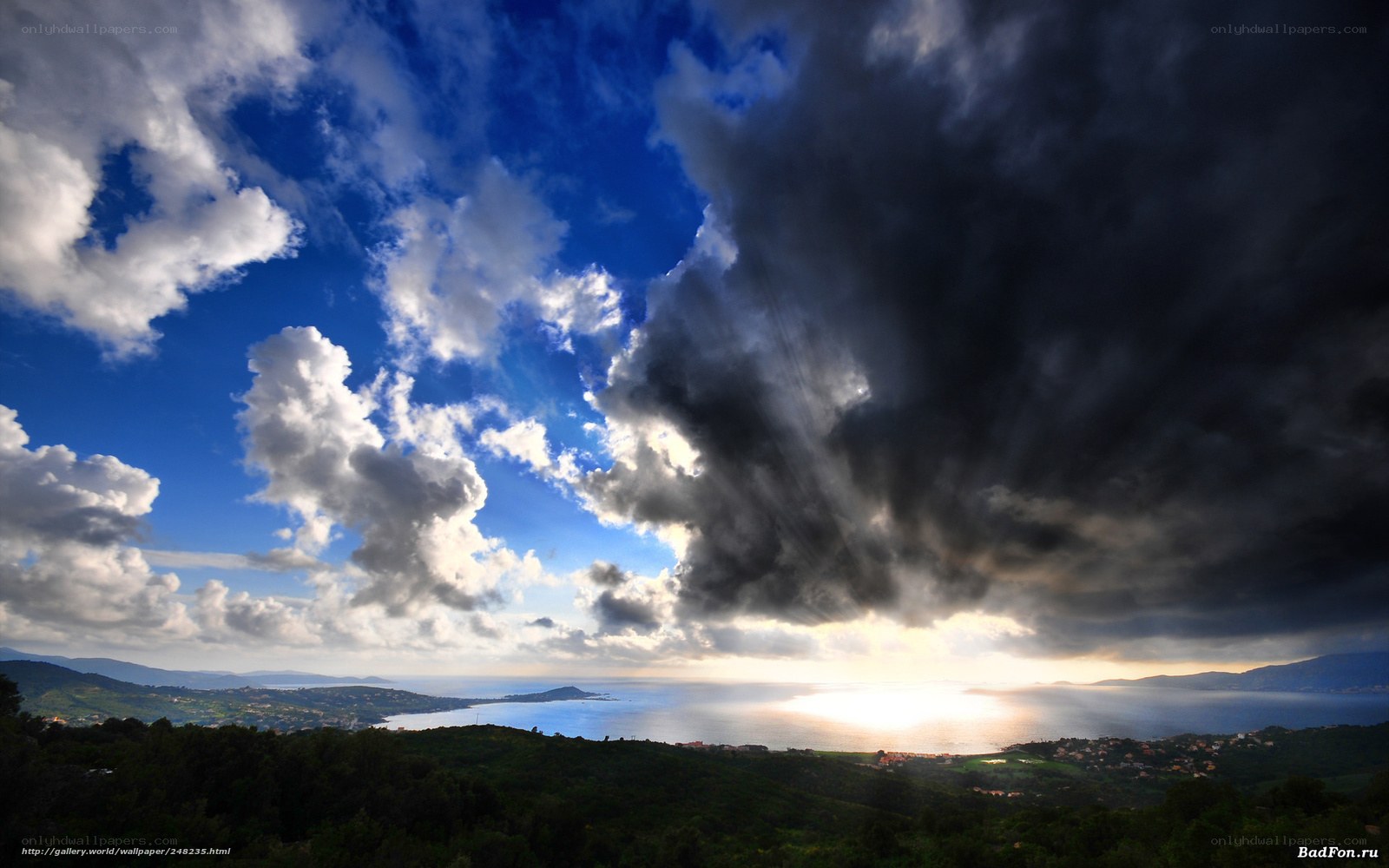 Dramatic sky over coastal landscape