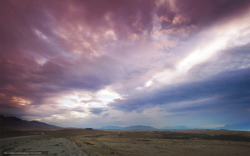Dramatic sky over desert landscape