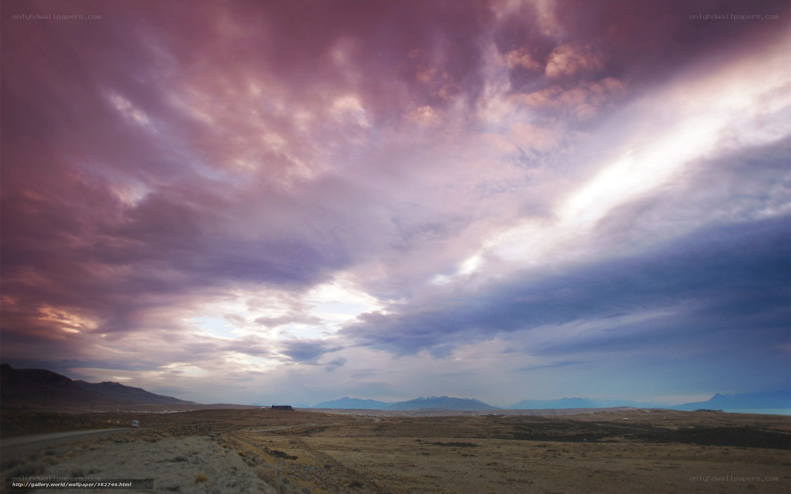 Dramatic sky over desert landscape