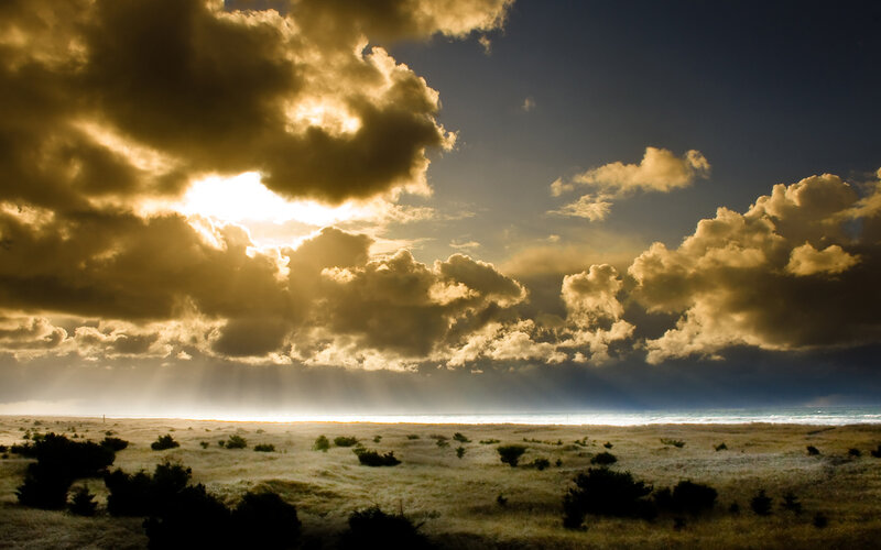 Dramatic Sky over Dunes — Gold
