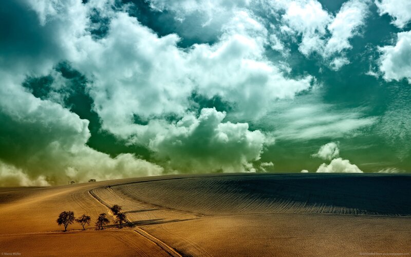 Dramatic sky over farmland