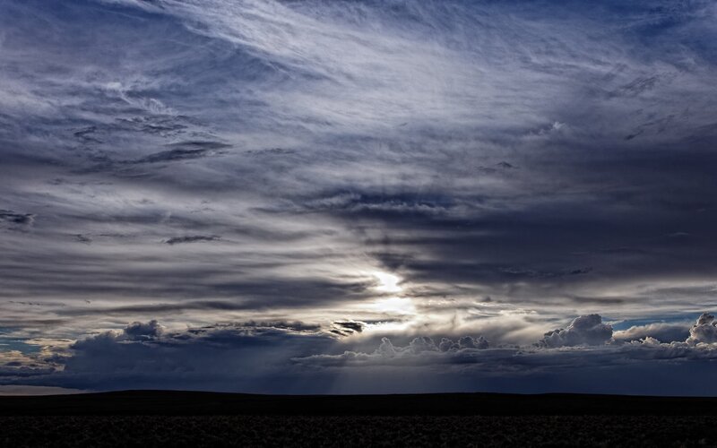 Dramatic sky over open plain