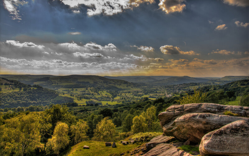 dramatic sky over rolling hills