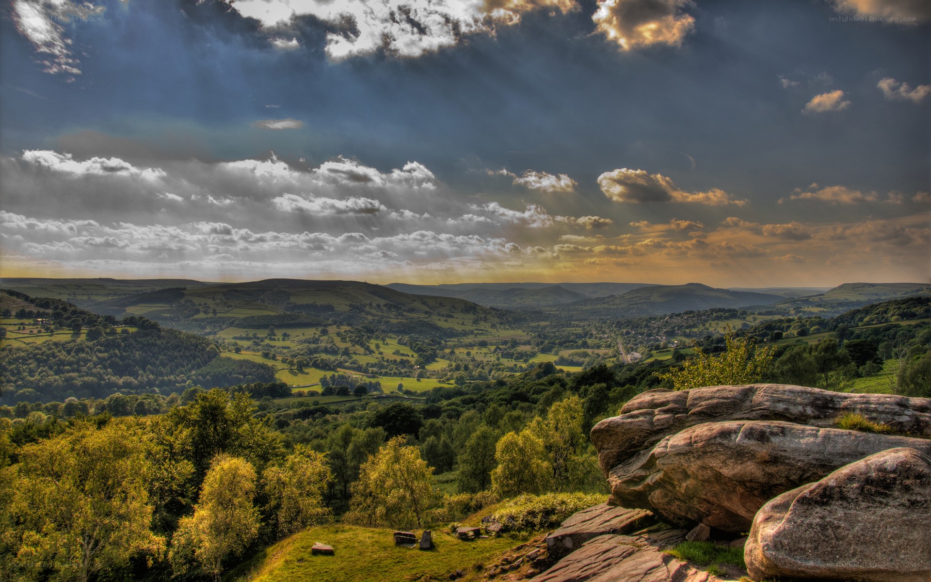 dramatic sky over rolling hills