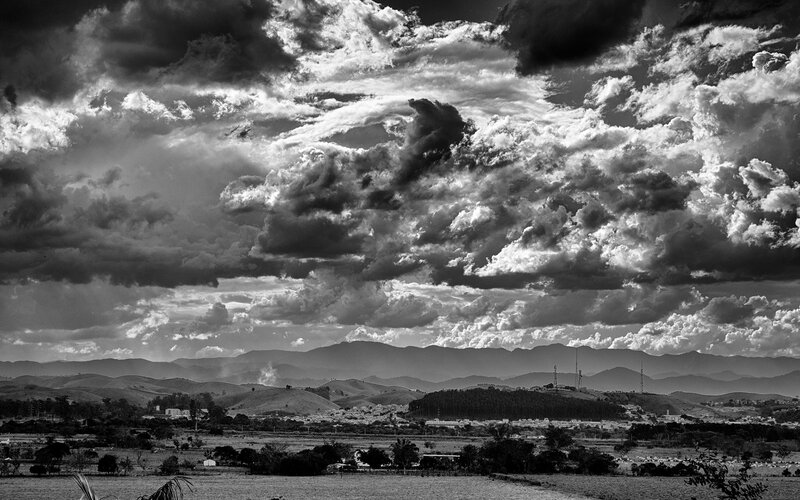 Dramatic sky over rolling hills