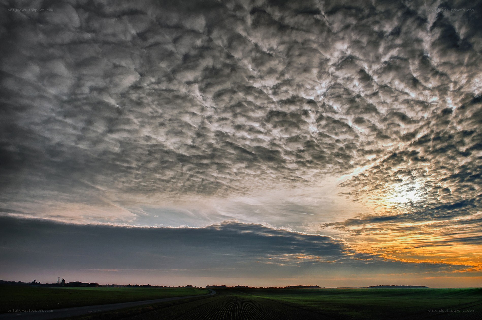 Dramatic sky over rural fields