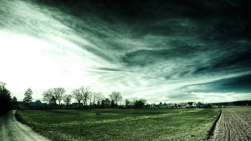 Dramatic sky over rural landscape