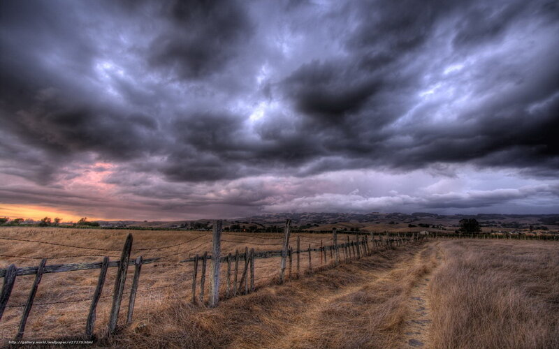 Dramatic sky over rural path