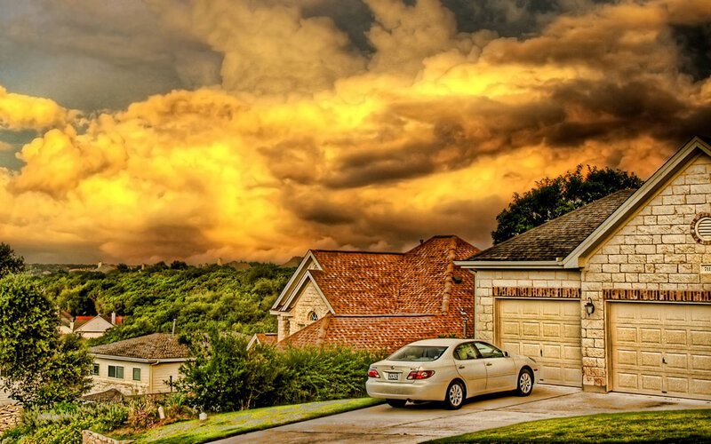Dramatic sky over suburban homes