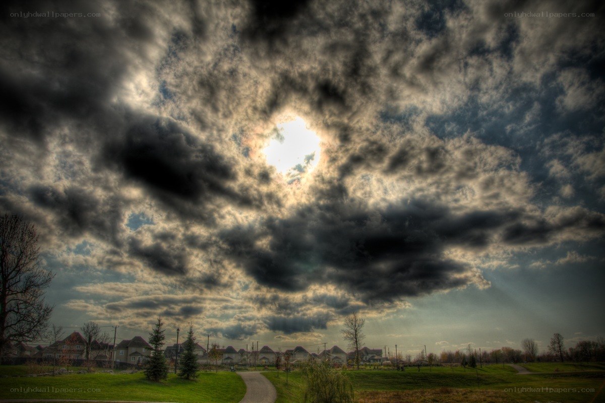 Dramatic sky over suburban park