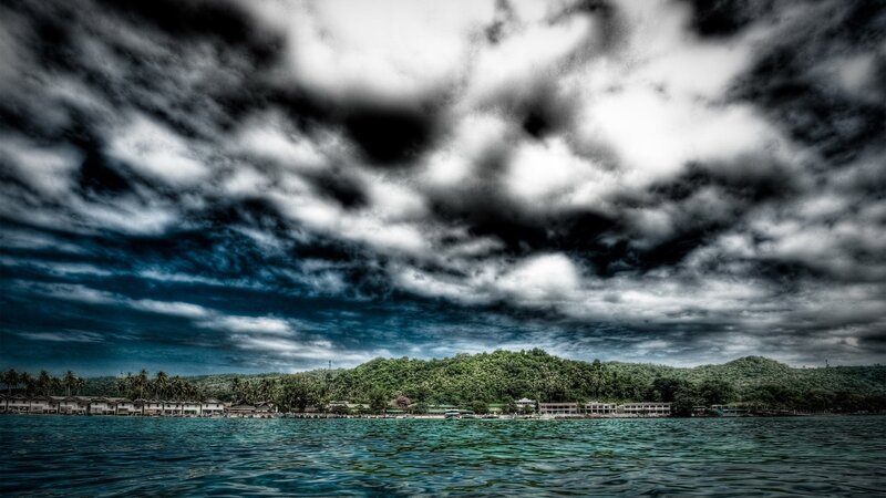 Dramatic sky over tropical island