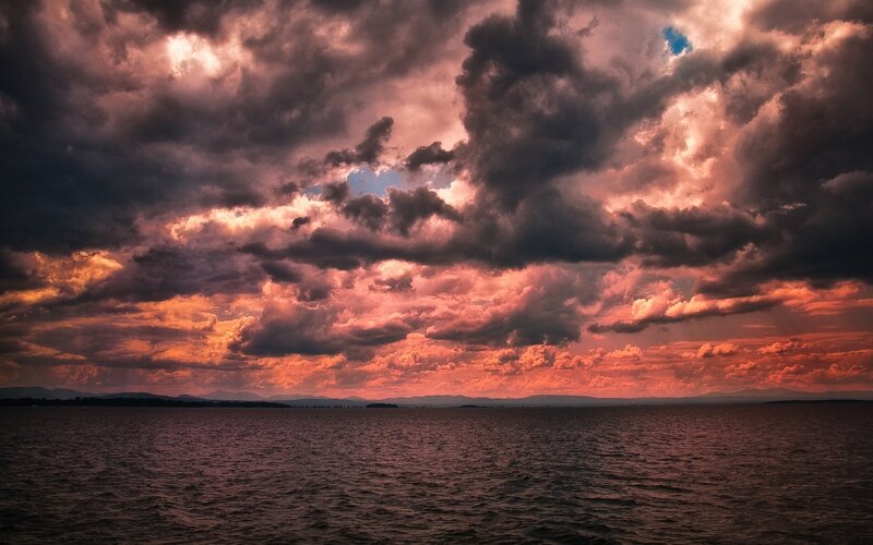 Dramatic Sky over Water — Orange