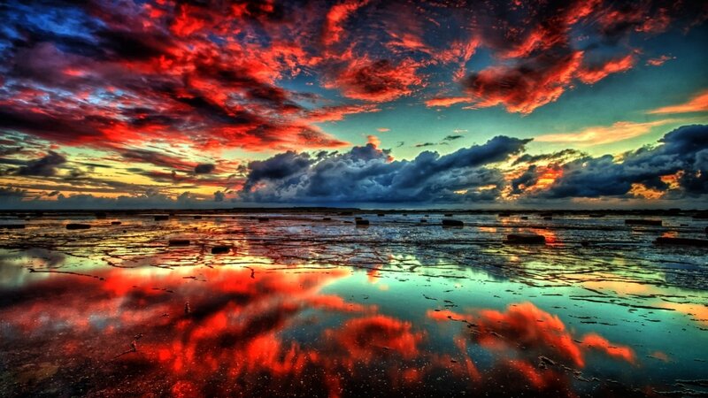 Dramatic Sky over Wet Beach — Red