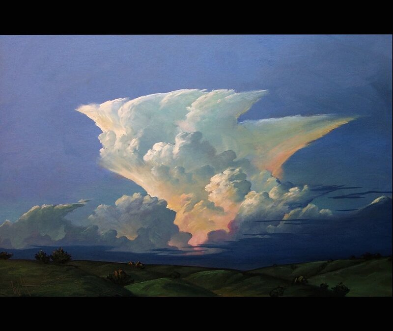 Dramatic storm cloud over hills