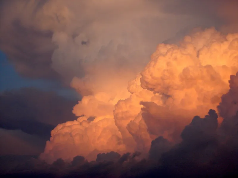 Dramatic storm clouds at sunset