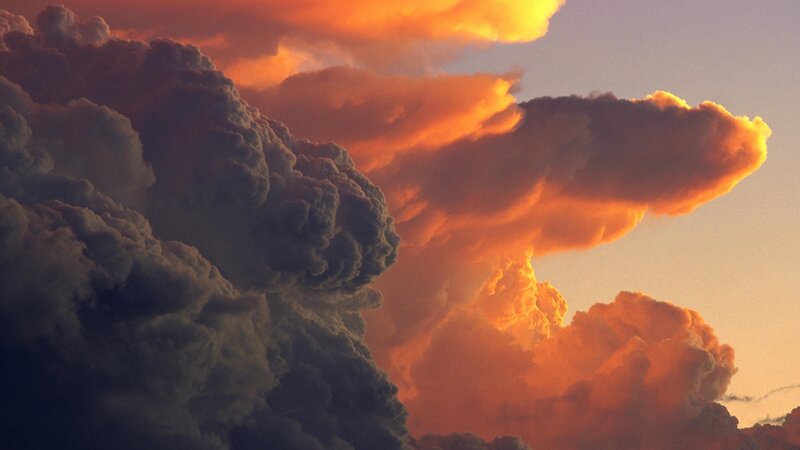 dramatic storm clouds at sunset