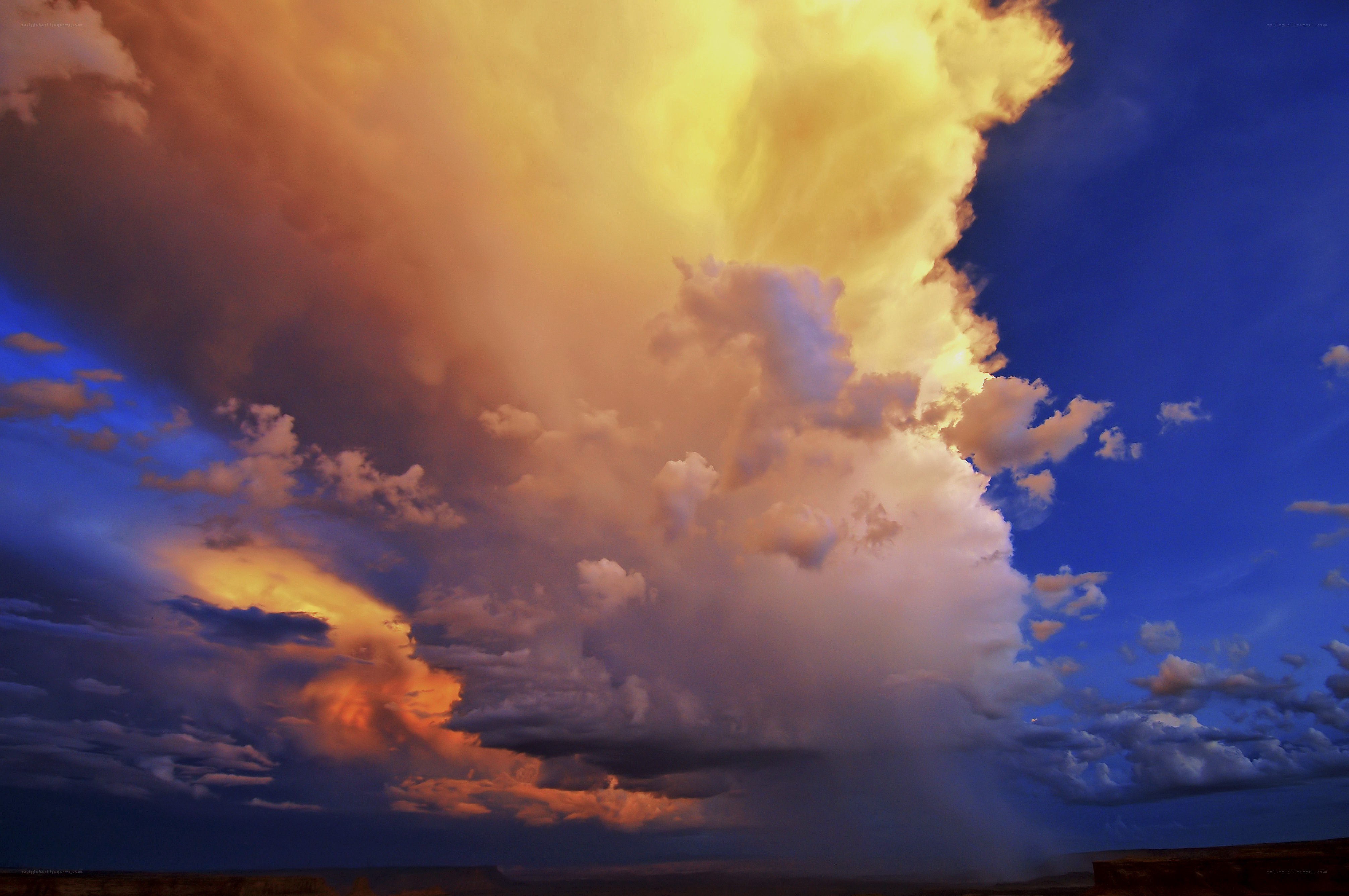 Dramatic storm clouds at sunset